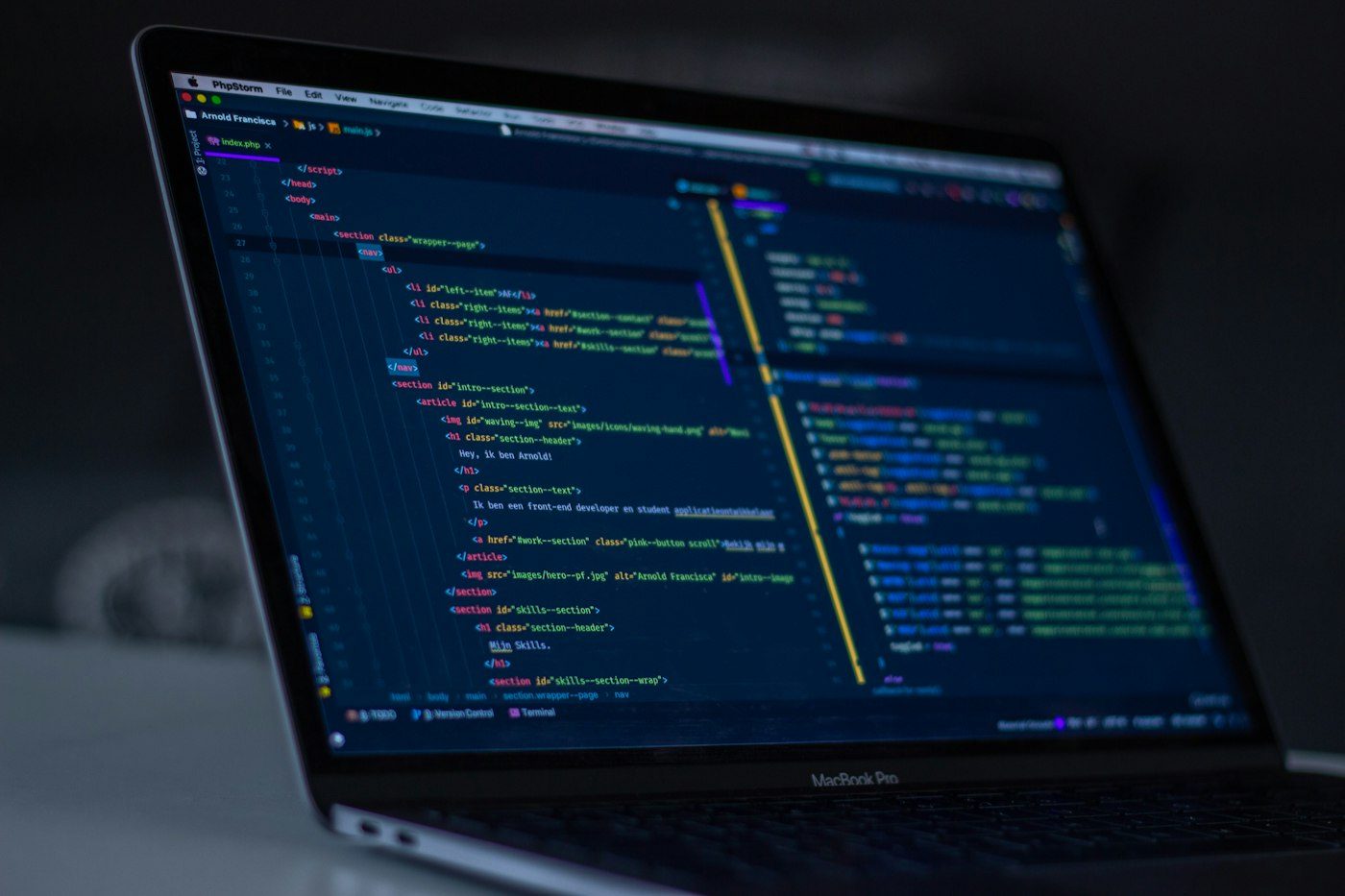 Close-up of a code editor with syntax-highlighted program text